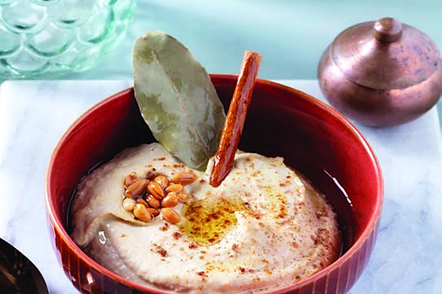 Meze in Ottoman Cuisine: Cold Starters at Deraliye 1 Deraliye Restaurant - humus chickpea paste meze served in a red bowl