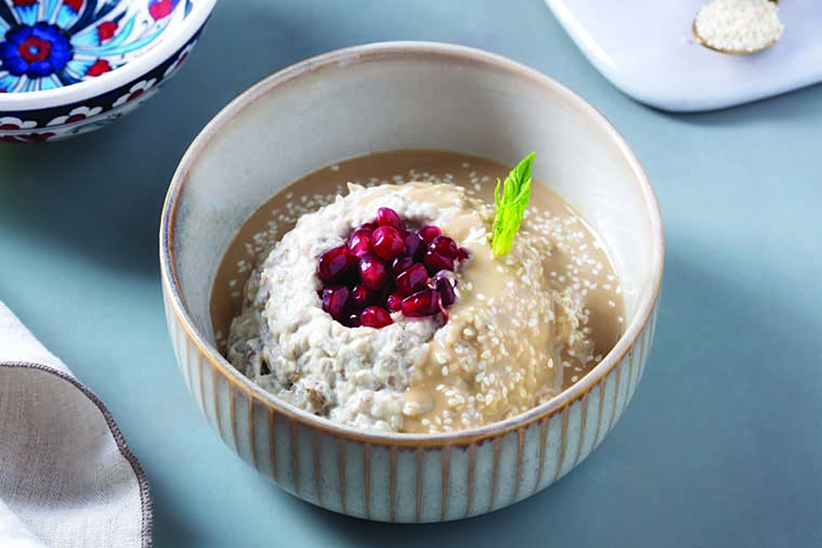 Meze in Ottoman Cuisine: Cold Starters at Deraliye 3 Deraliye Restaurant - mutabbal aubergine meze topped with pomegranate seeds