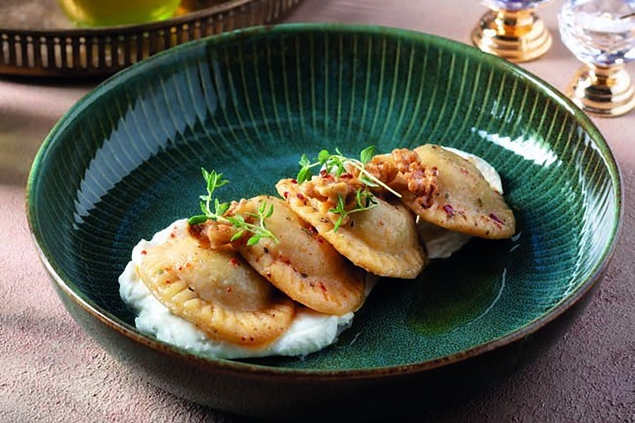 Deraliye Restaurant - vegetarian piruhi dumplings with yogurt and toasted walnuts