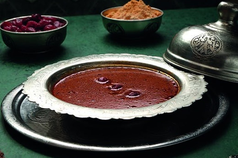 Ottoman Soups at Deraliye: Lentil Soup and Tarhana with Sour Cherry 1 Deraliye Restaurant - tarhana soup with sour cherry served in a silver bowl